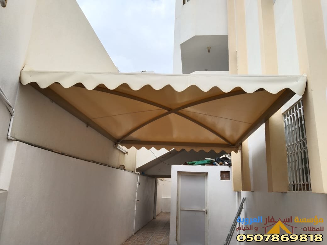 مظلات للأبواب الخارجية - تركيب مظلات فوق مداخل الأبواب