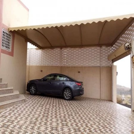 تصميم مظلة سيارة تناسب مساحة الحوش بالمدينة المنورة